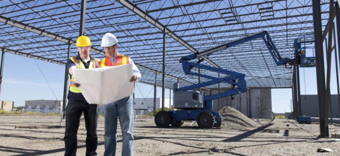 Construction Workers and Steel Frame Building