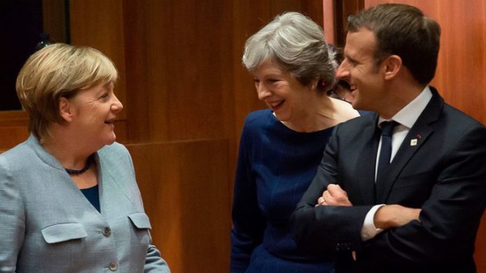 skynews-theresa-may-emmanuel-macron_4132408