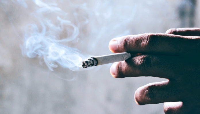 cigarette-burning-in-hand_1600