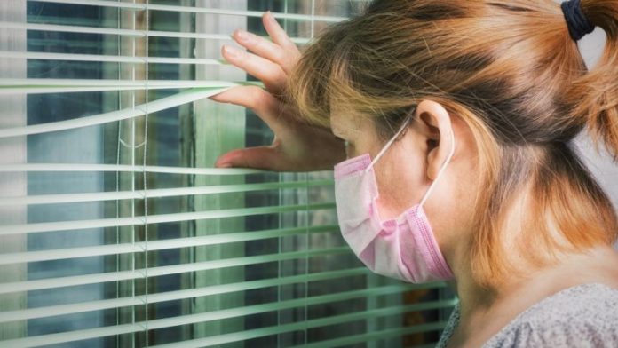 anxious-woman-with-protective-mask-780x439