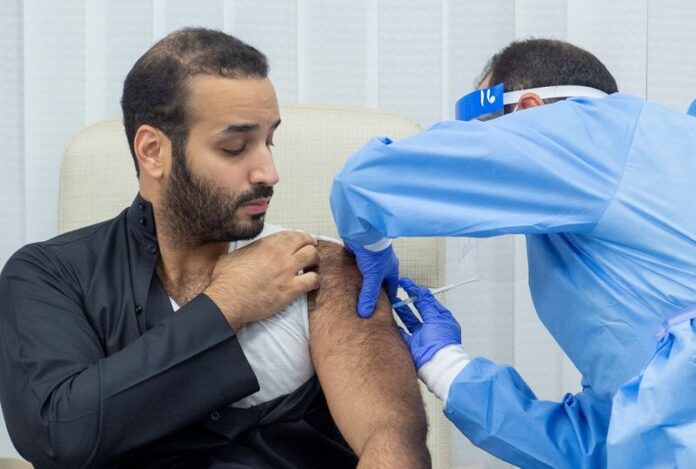Saudi Crown Prince Mohammed bin Salman gets a dose of a coronavirus disease (COVID-19) vaccine in Riyadh