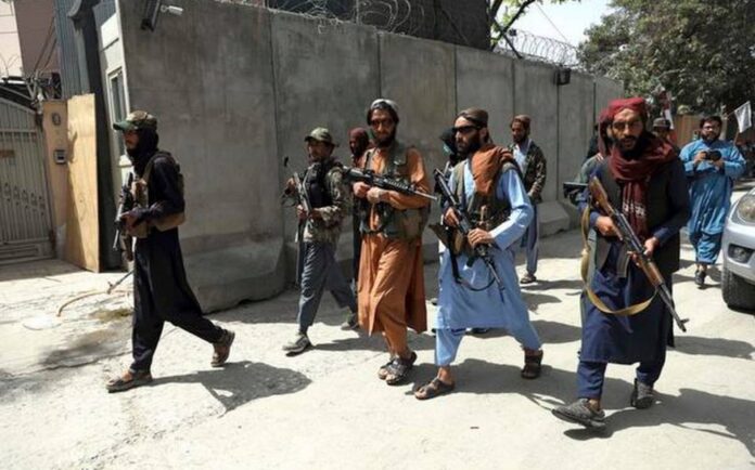 Taliban-fighters-patrol-in-Wazir-Akbar-Khan-1024x639