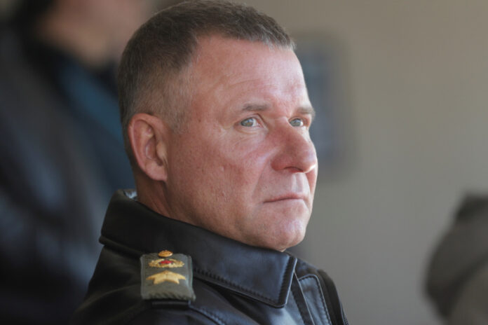 Russia's Emergencies Minister Yevgeny Zinichev look on during a drill in Krasnoyarsk region