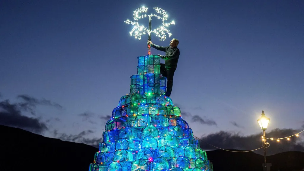 Christmas tree made from fishing nets lights up Scottish village
